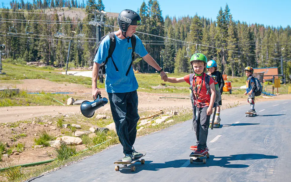Skate Camp Holding Hand