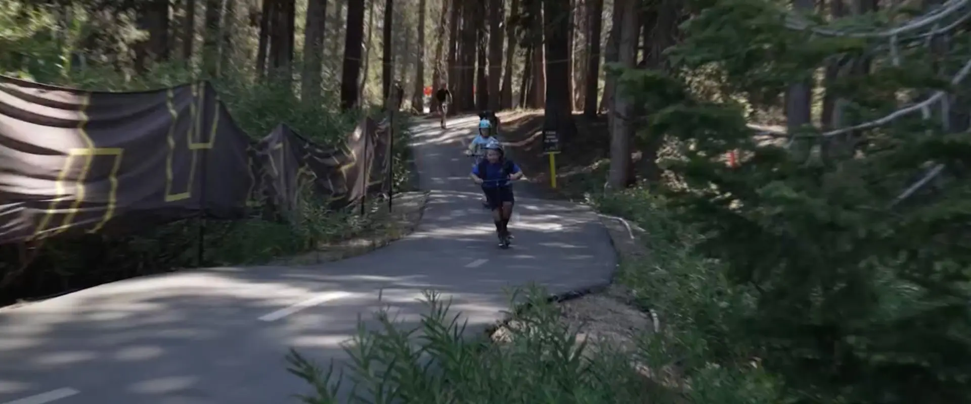 Kids riding skateboards down The Path at Summer Camp at Woodward Tahoe